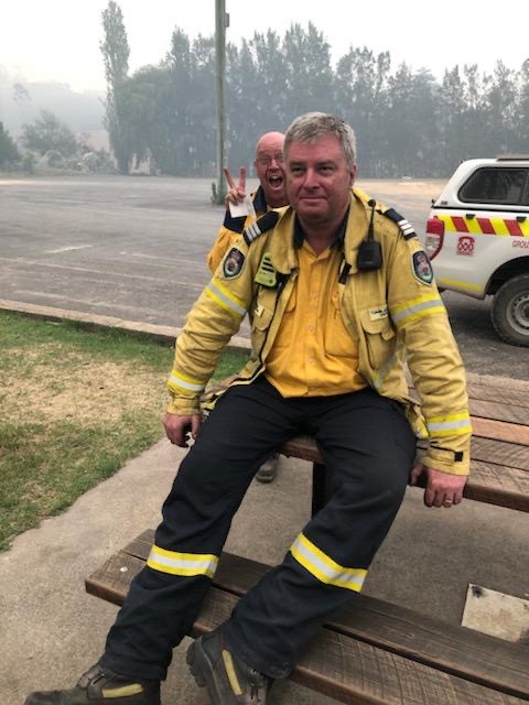 John and his colleague enjoying a moment of comic relief after defending small town Nelligen, just outside of Batemans Bay.