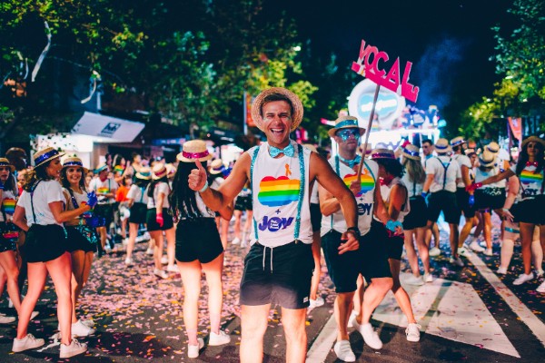 James walking down Oxford Street as out, vocal and proud as part of the Salesforce float.