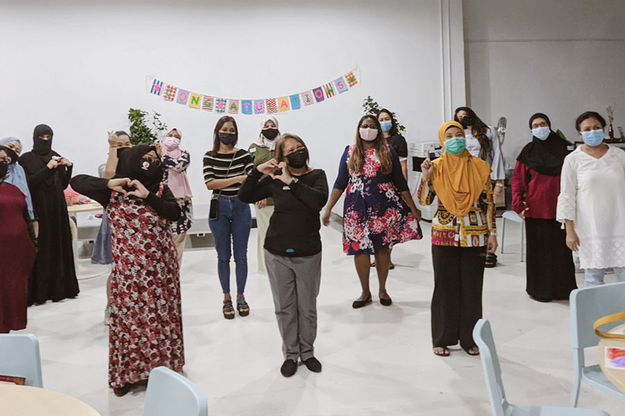 Women taking part in a DOT Confidence Curriculum workshop.