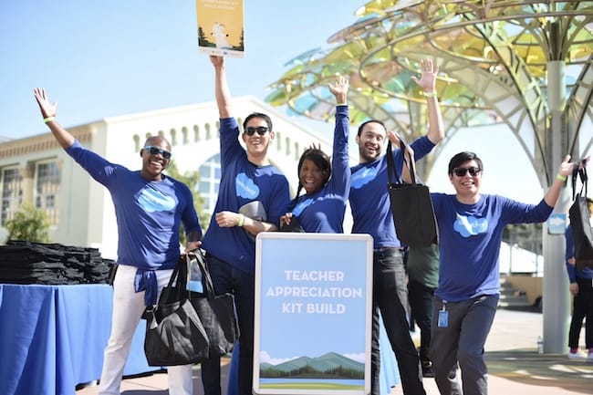 Photo of Salesforce volunteers at Presidio Middle School preparing to build teacher appreciation kits.