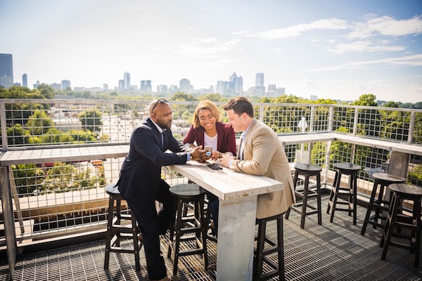 Salesforce employees in the Atlanta regional office participate in a meeting
