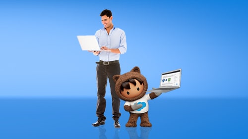 Astro and a man holding laptop computers