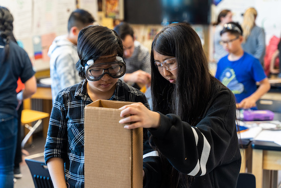 Children try out collaborative solutions in the classroom