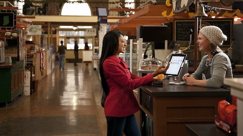 A customer transaction at a POS station