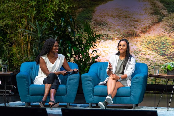 Photo of Ebony Beckwith and Maria Running Fisher-Jones on stage