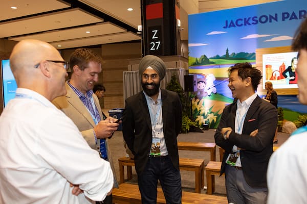 Attendees share insights at the customer engagement event of the year.