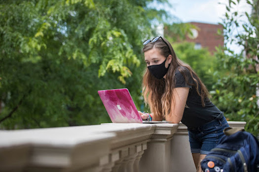 A female student wearing a face mask