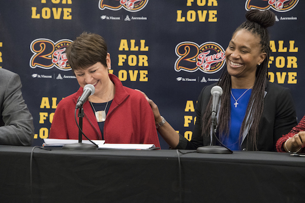 The Indiana Fever's Allison Barber and Tamika Catchings at a press conference