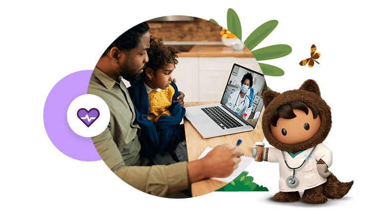 Man with child looking at telehealth provider on laptop; Astro in the background.