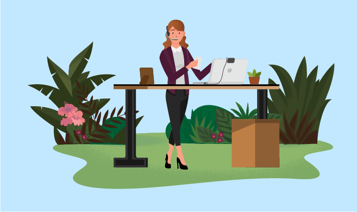 Female agent wearing a headset at a standing desk