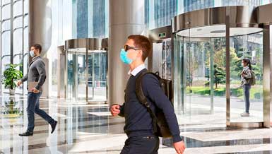 Employees wearing PPE masks