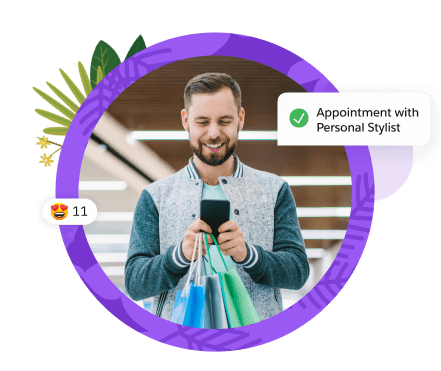 A shopper uses his mobile phone to schedule an appointment with a personal stylist.