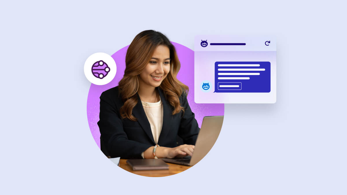 A smiling woman using a laptop with the help of Agentforce