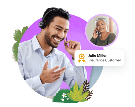 Male agent on phone call with an insurance customer, a woman holding a cell phone.