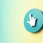 An illustration showing a pointer finger pointing up in a circle, showcasing pay-per-click advertising.