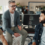 A group of developers discussing a problem
