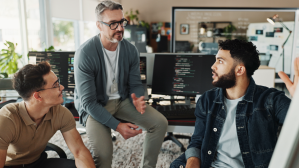 A group of developers discussing a problem
