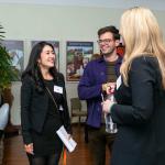 An event photo from Salesforce Startup Summit including attendees collaborating over GTM strategies.