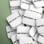 ServiceNow logo on white chips scattered on a green background.
