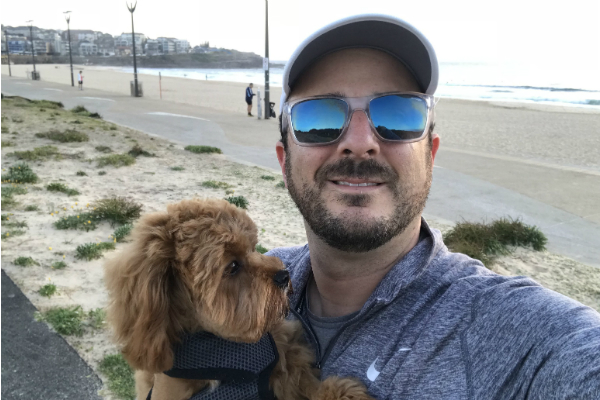 Dan Bognar looking after his wellness with his dog.