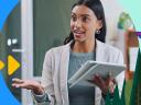 Sales pitch: a woman holding a tablet while talking