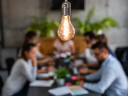 A group of people ideating around a table.