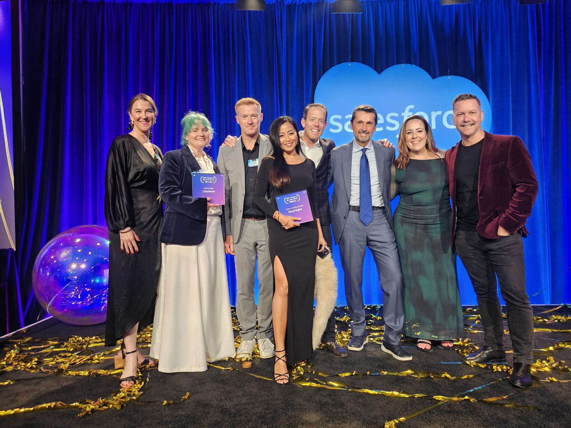 Group photo from 2027 Partner of the Year awards featuring ANZ winners Cloudwerx (left) and Xenai (middle).