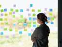 Woman views ideation board