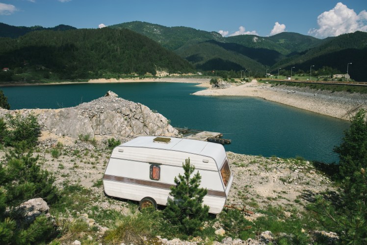 RV parked by a lake