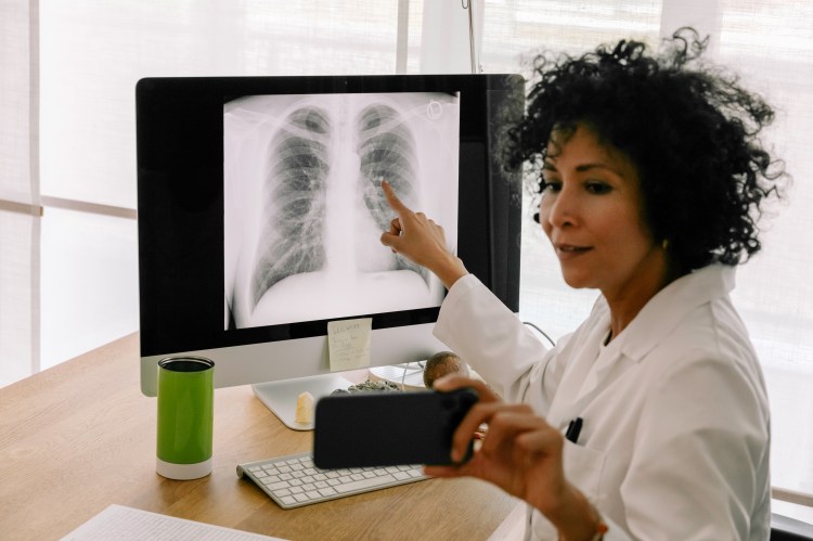 Doctor Explaining Lung X-Ray via video chat