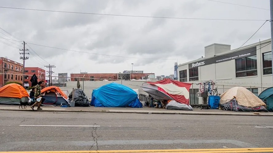 A group of tents occupied by unhoused people