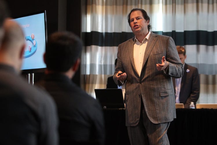Photo of Marc Benioff giving a keynote at the St. Regis hotel in 2011