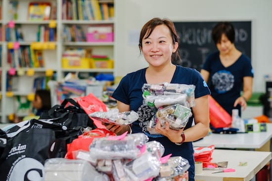 photo of a volunteer at a supply drive