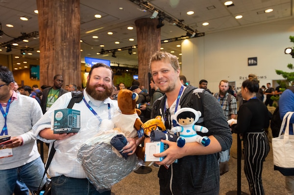Attendees with coveted Salesforce character plushies