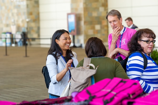 Volunteers stuff backpacks to benefit SFUSD students at TDX 2019