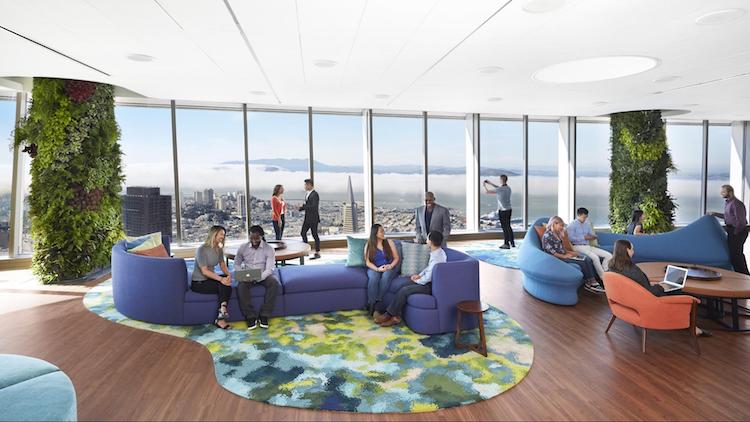 Visitors sit and enjoy the view in the 61st floor's lounge area