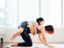 Mother and daughter doing yoga