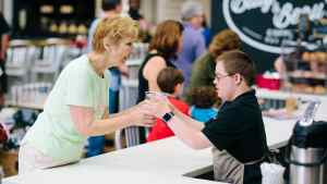 Bitty & Beau's worker serves up a coffee
