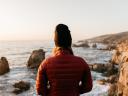 woman in big sur looks at ocean