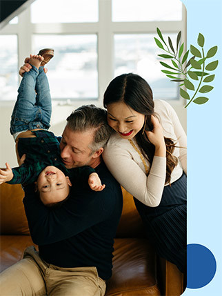 Mai (right) with her child and partner.