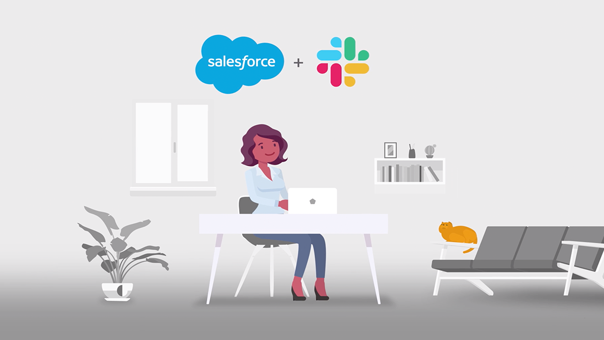 Woman working at home on computer sits under Salesforce and Slack logos. The integration of the platforms will help her close sales deals fast.