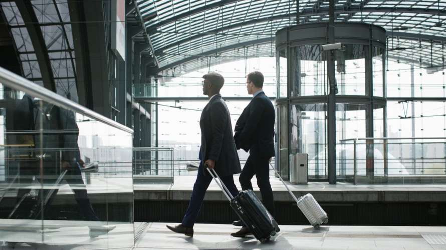 travelers walking in airport