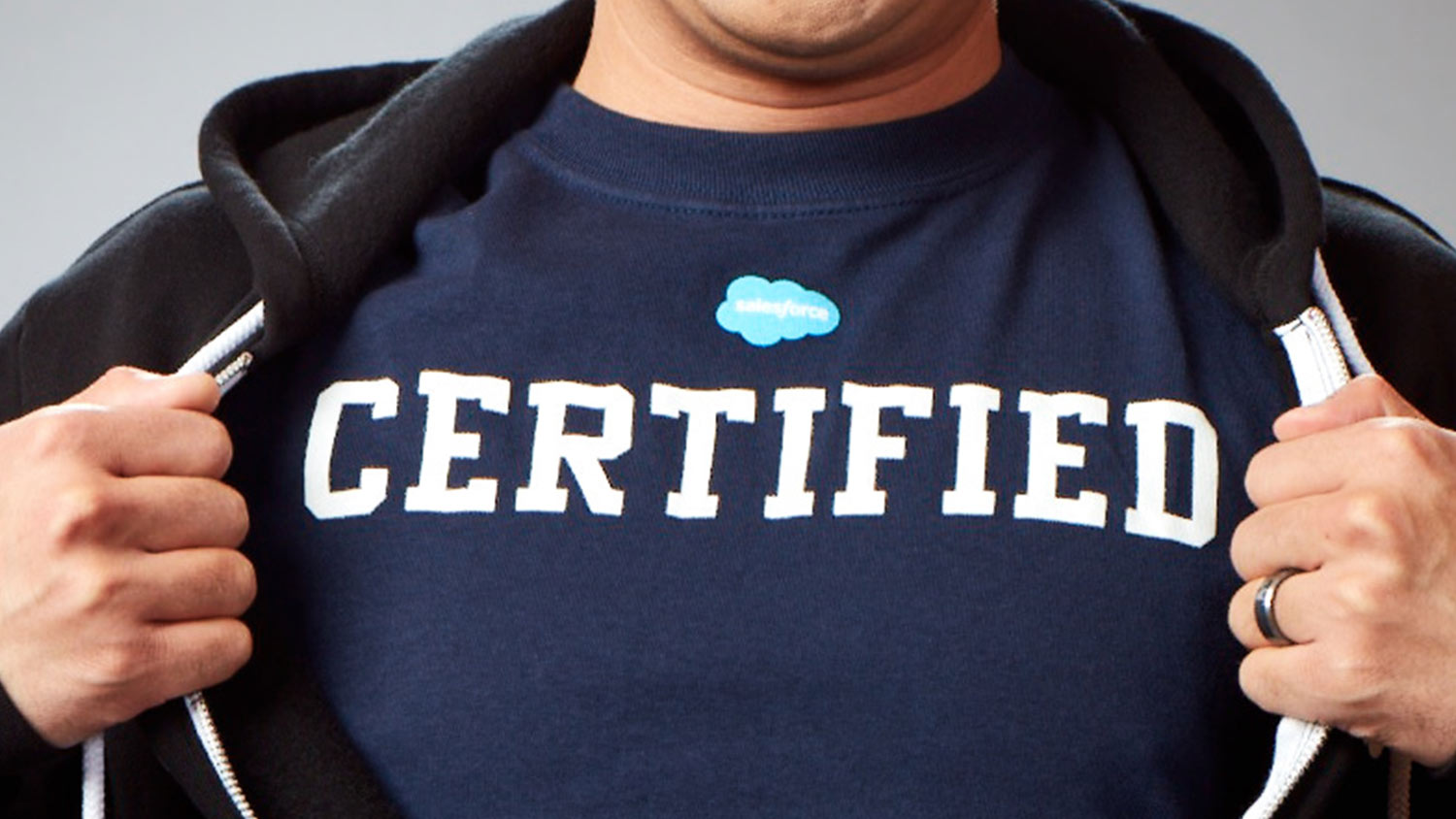 A zoomed in photo of a Trailblazer showing the Salesforce Certified logo on their t-shirt