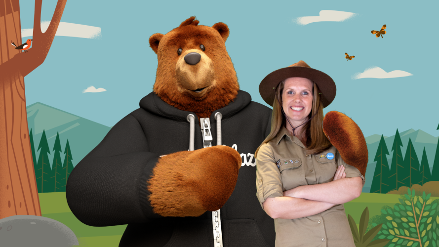 Trailhead Ranger Megan stood with Salesforce character Codey-the-bear against a forest background.