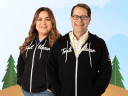 Two Salesforce certified people standing in Trailblazer hoodies