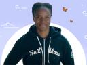 Photo of Trailblazer Amanda Ouedrago in a black Trailblazer hoodie against a purple background