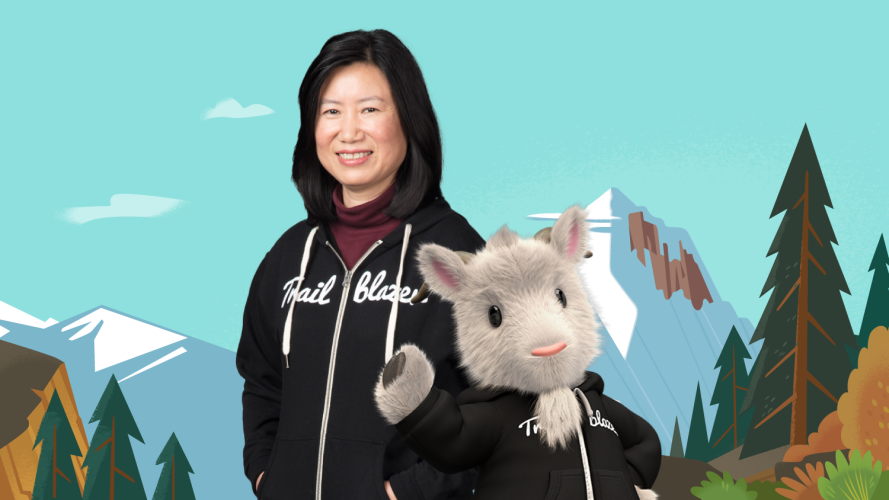 Trailblazer Shuang Stoppe with Cloudy-the-goat both in iconic Trailblazer hoodies against a forest background