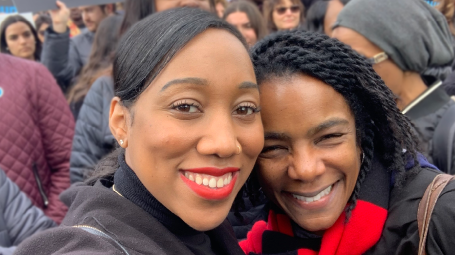 Photo of the Trailblazer series creators, Vatora Godwin and Leah McGowen-Hare, together at a march.