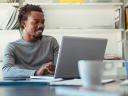 A man typing on his laptop, possibly viewing the Winter ’23 sandbox preview.