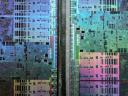 Abstract microscopic photography of a Graphics Processing Unit resembling a satellite image of a big city